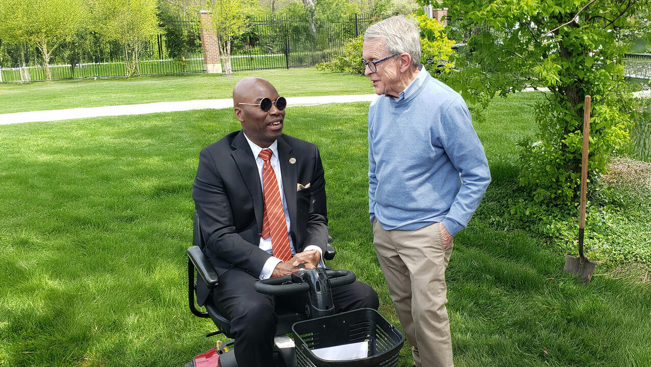 President Kuti speaks with Ohio Gov. Mike DeWine (right), a valued friend of Central State University.