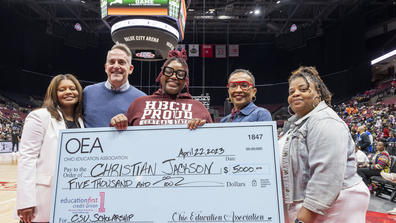 Ohio Education Association’s Assistant Executive Director Airica Clay, Ohio Education Association Vice President Jeff Wensing, Christian “Chrissy” Jackson, Central State University College of Education Interim Dean Lillian Drakeford, and Chrissy's mother, Shonda Peavy. The group is holding a large check made out to Chrissy totaling $5,000 for the top Aspiring Educator Scholarship. The scholarships were presented in Columbus on April 22.
