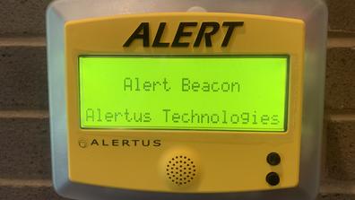 An Alertus Technologies mechanism with the words Alert Beacon and Alertus Technologies