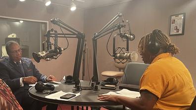 Central State University Interim President Dr. Alex Johnson interviews on the air with Cheryl Durgans, editor and co-owner of the Yellow Springs News, at WCSU