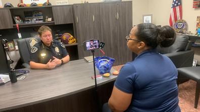 Central State University Police Chief Stephanie Hill interviews on a cellphone camera with Spectrum News 1 on campus safety