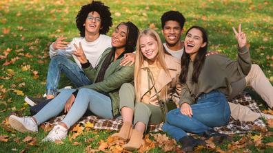 Multiethnic Group of Teenagers Having Fun Outdoors