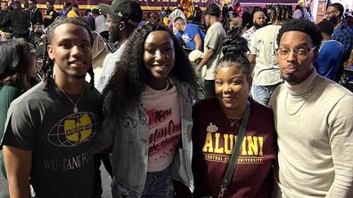 central state university students with residence hall coordinator and alumna teeya skipper