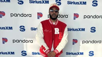 saeed coleman in front of siriuxXM and pandora step and repeat