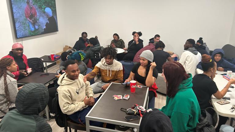 Students socialize in a residence hall at Central State University
