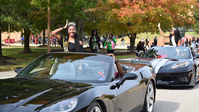 a member of the royal court in the parade