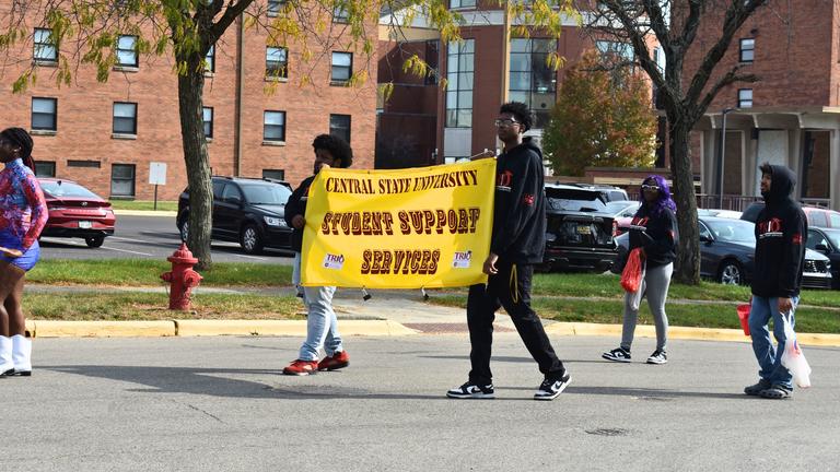 students with a student support services banner