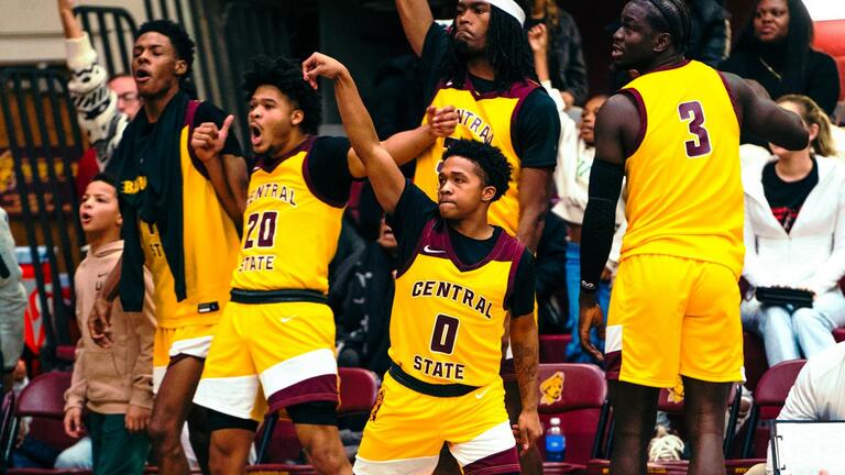 marauders men's basketball team celebrates win over lane college