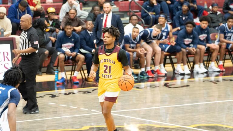 marauders point guard dribbling the ball on offense