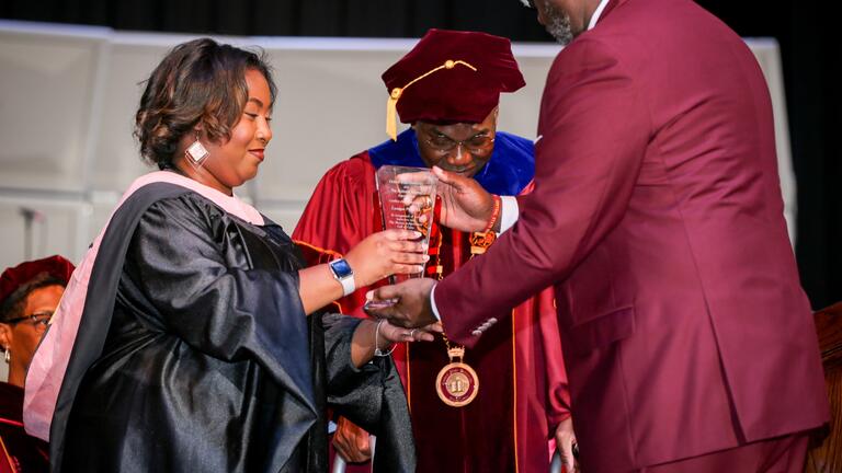 victoria ellington accepts award on behalf of leontyne price