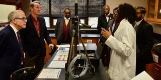 state officials and university administrators visit central state university classrooms