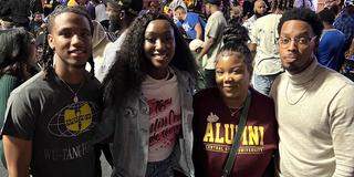 central state university students with residence hall coordinator and alumna teeya skipper