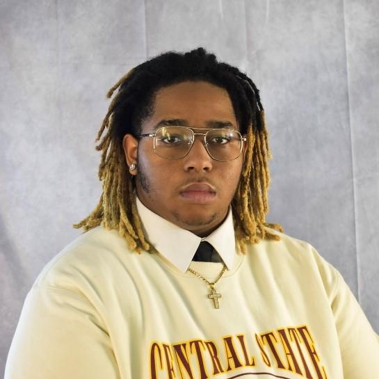 Denzel McCoy, an intern with Nationwide, is pictured in a Central State University sweater with "Central State" visible