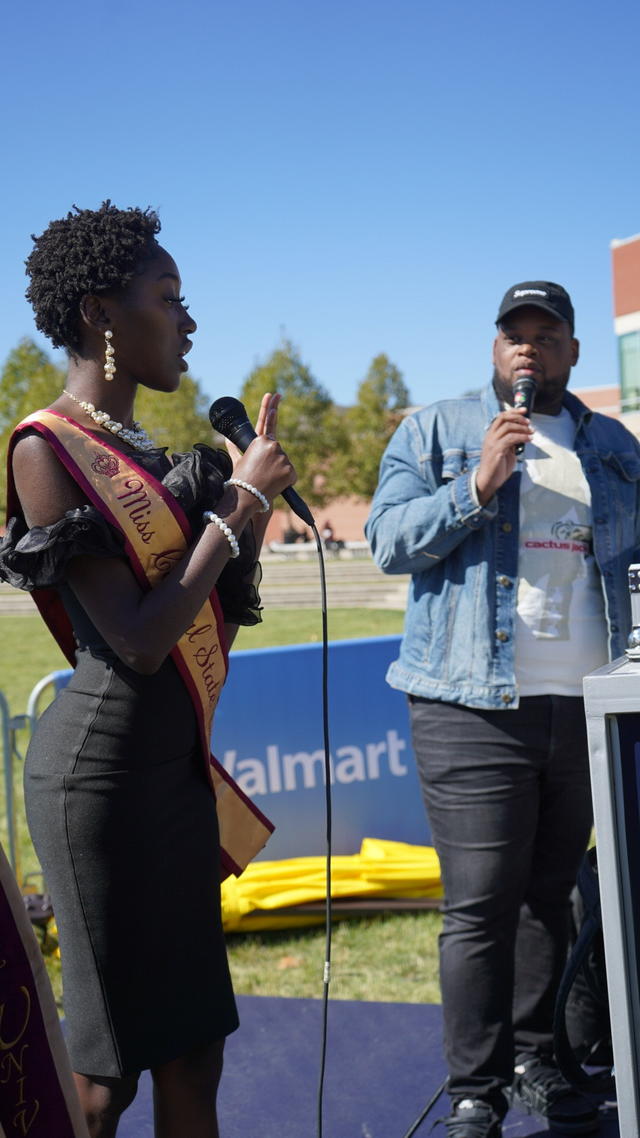 two people holding microphones