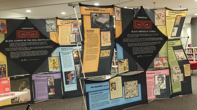 a display about the history of black comics at the national afro-american museum and cultural center