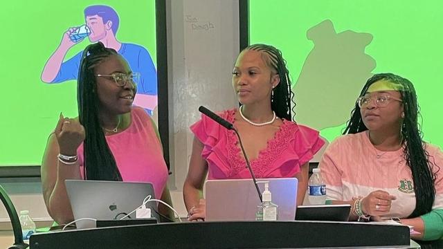 three young Black women serve as a panel at Central State University