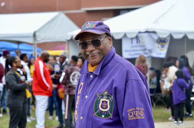 a smiling alum at central state university