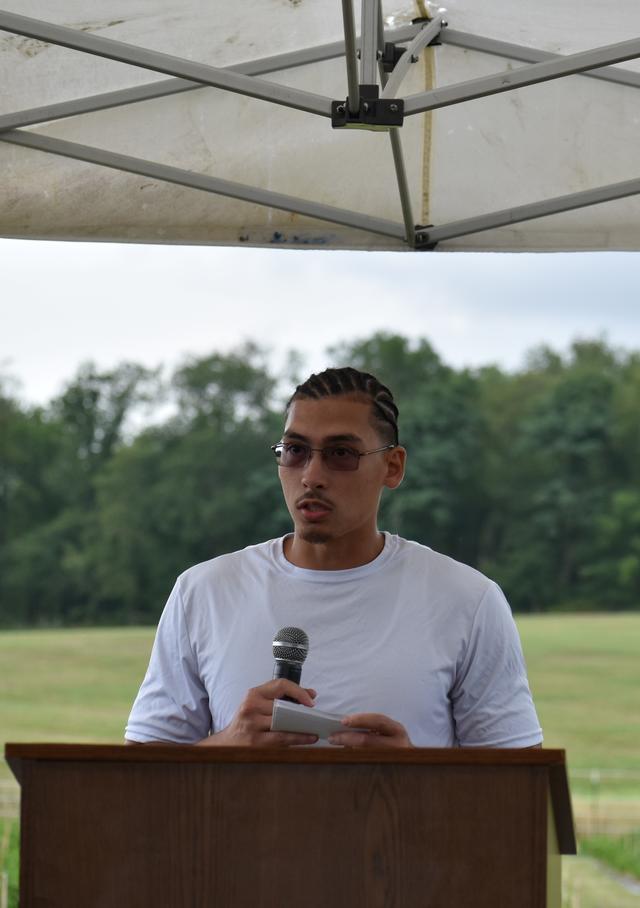 An inmate speaks during a ribbon-cutting ceremony about the importance of an urban farming and teaching program at Richland Correctional Institution in Mansfield, Ohio, led by Central State University Extension.