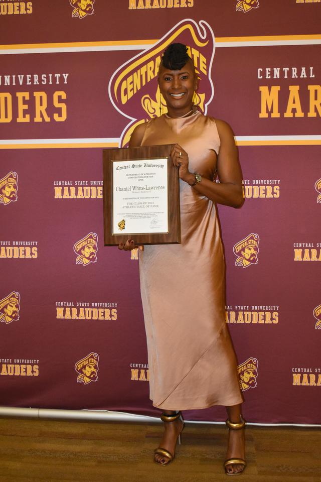 Chantel White-Lawrence in front of a marauders backdrop