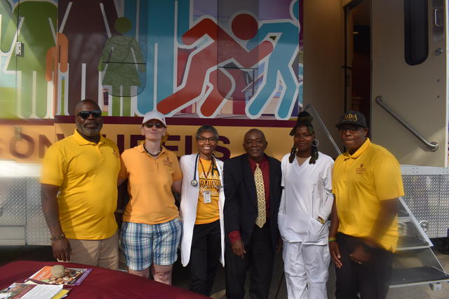 CSU Health Education Mobile Unit team include (left to right) Price Collier, Lindsay Andrews,  Health & Psychological Services Executive Director Dr. Karen Mathews, Dr. Joseph Frank, an unidentified community volunteer, and James Keys.