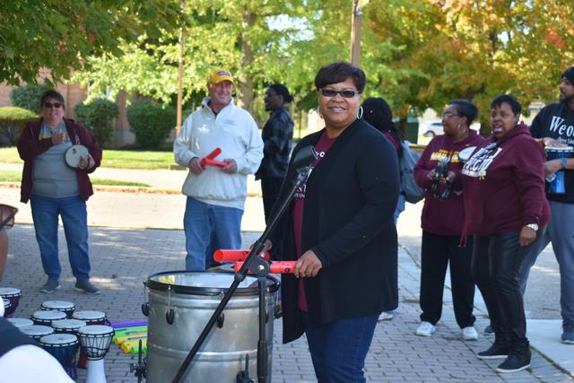 jaylen simmons plays a large drum before the walk