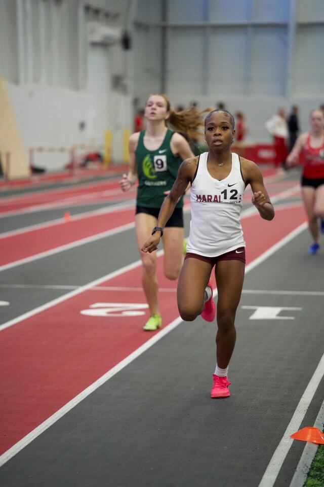 a central state university runner competing in indoor track and field